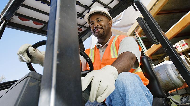Man operating a forklift